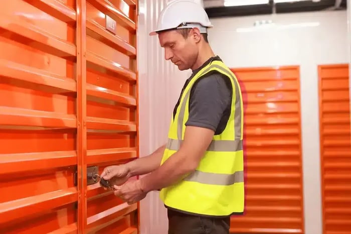 A contractor storing equipment at Mini Mall Storage
