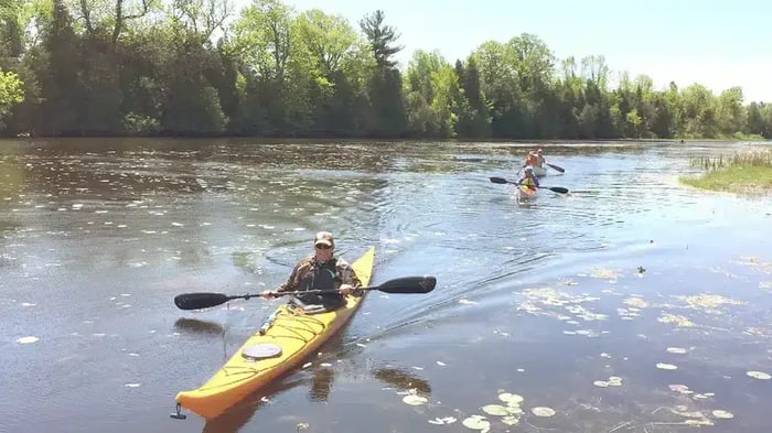 A group of people kayaking on the South Nation River