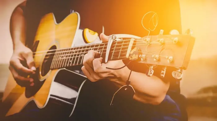 man playing guitar