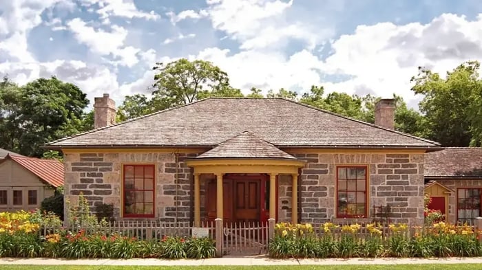 The McDougall Cottage Historic Site was built in 1858 has the design symmetry characteristic of the Georgian style