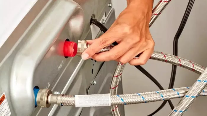 disconnecting and draining a washer for storage