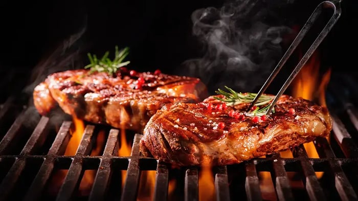 Steaks on a barbeque to highlight the Atoka BBQ Fest